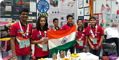 Robominds team holding the Indian flag at the FIRST World Championship